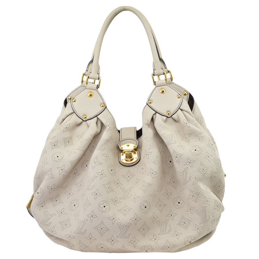 louisvuitton-cream-perforated-lv-leather-tote-bag-1